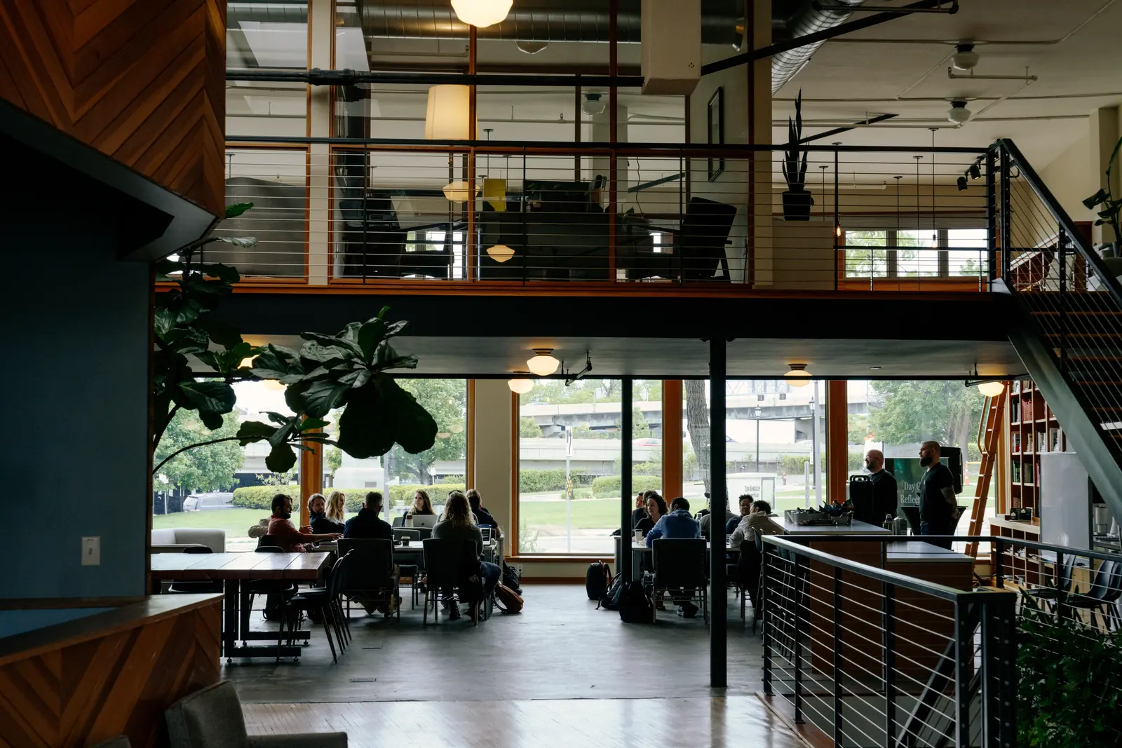 View from beneath the mezzanine across a busy event