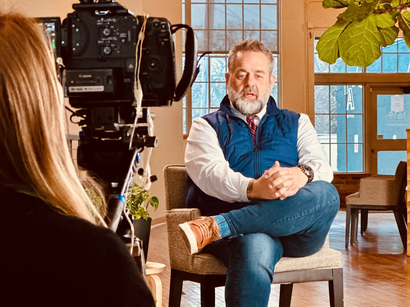 Interview shoot in progress with camera and monitor at Basecamp