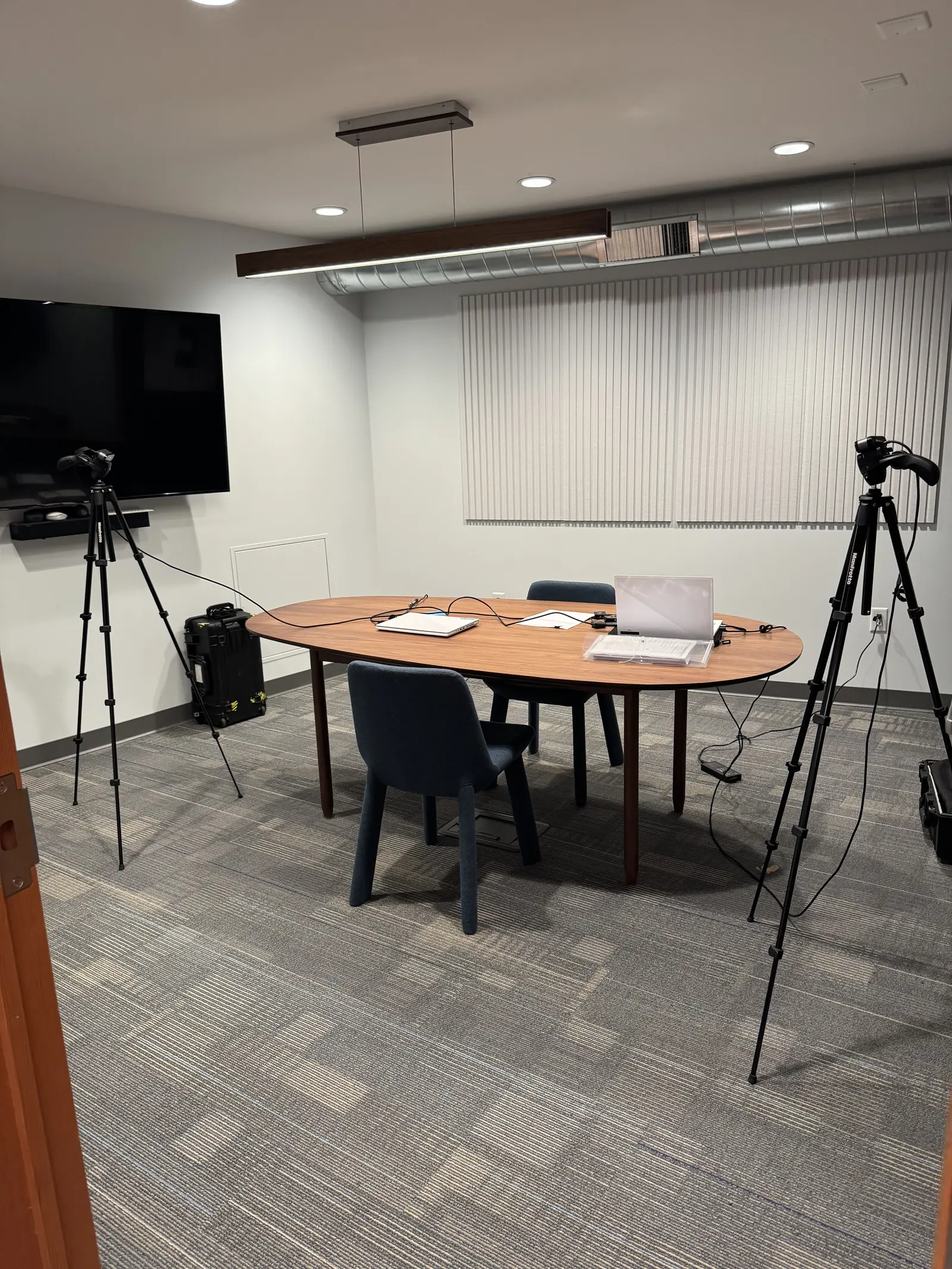Conference room set up with cameras for a research session
